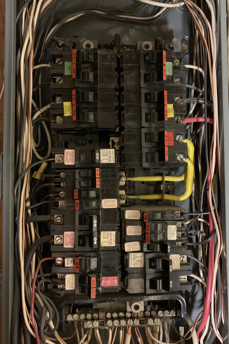 Before photo of an older electrical panel being reviewed for upgrade planning