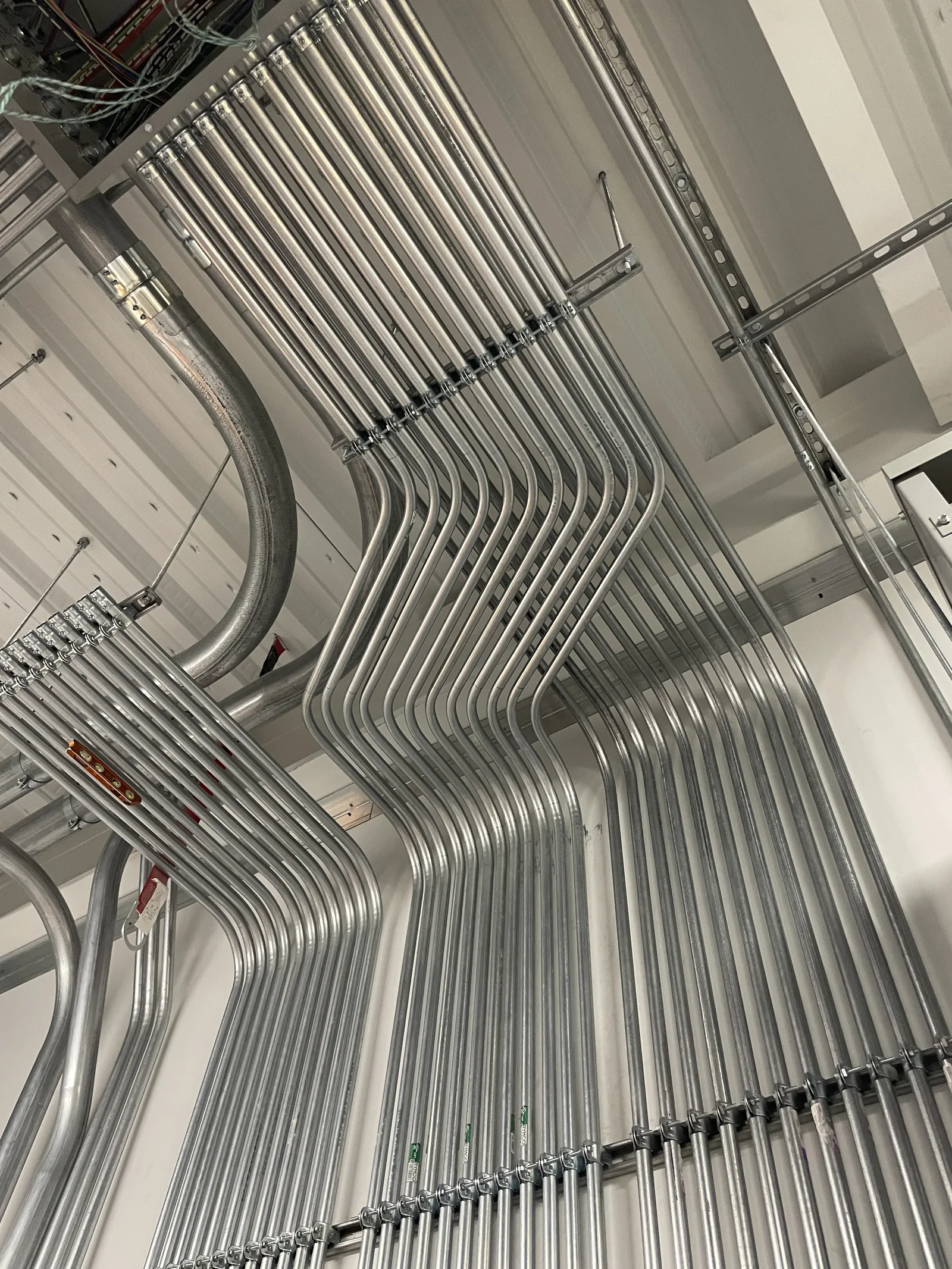 Clean conduit work showing organized electrical rough-in for a coordinated project